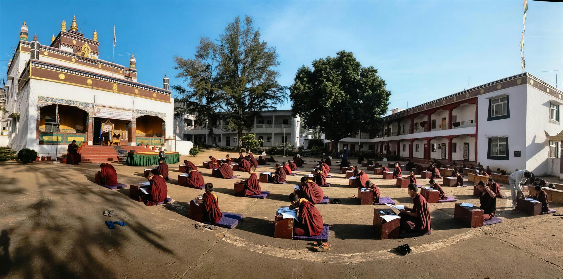 Young monks studying in the monastery courtyard